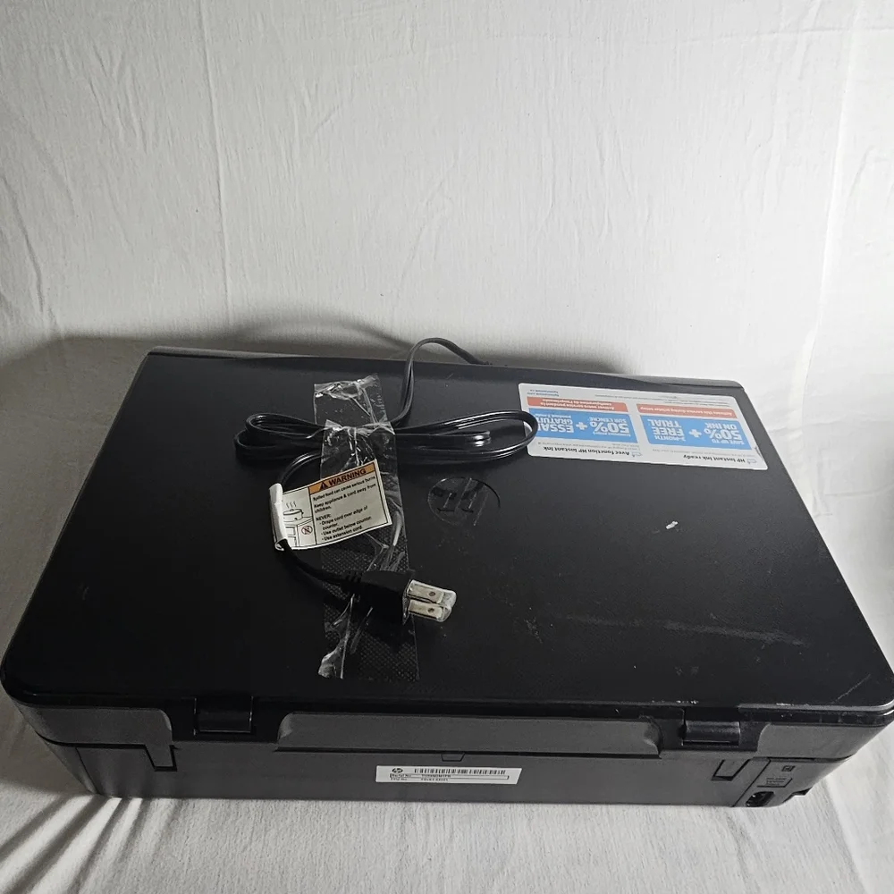 HP Black All-in-One Printer with Blue and White Instant Ink Sticker
